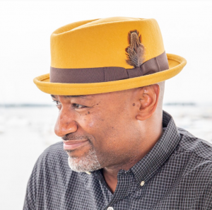 Man Wearing A Pork Pie Hat