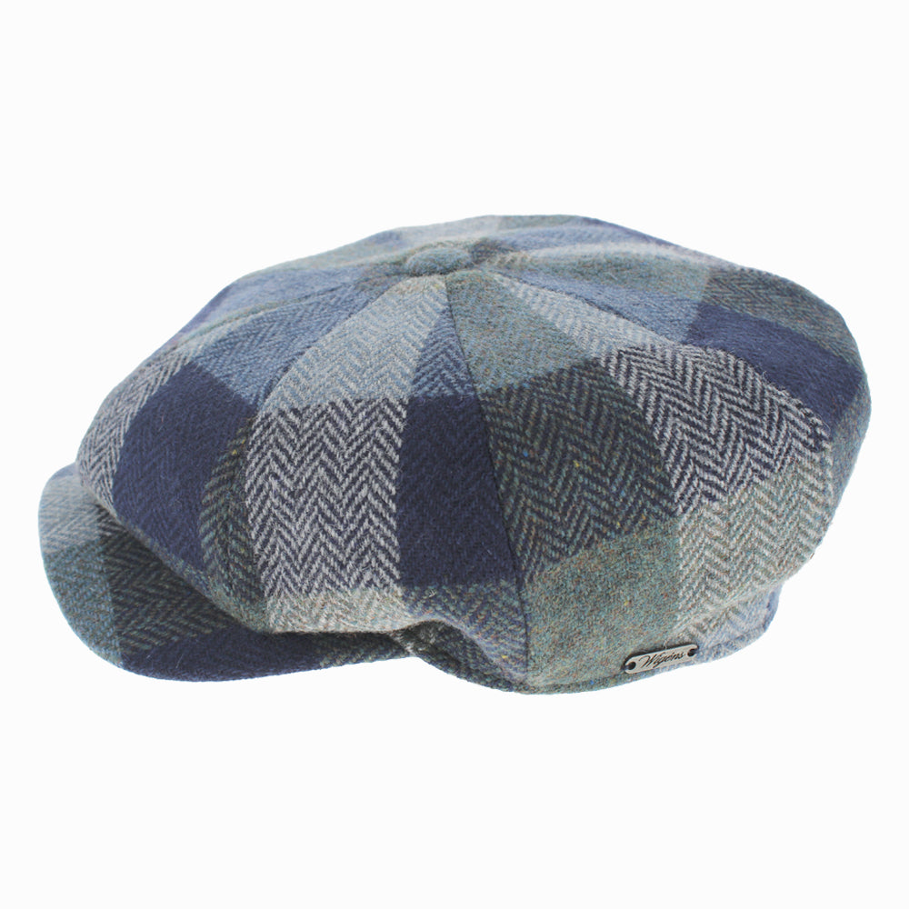 Classic navy Wigens Gil wool newsboy hat, vintage profile with full retro 8-panel cut for winter style