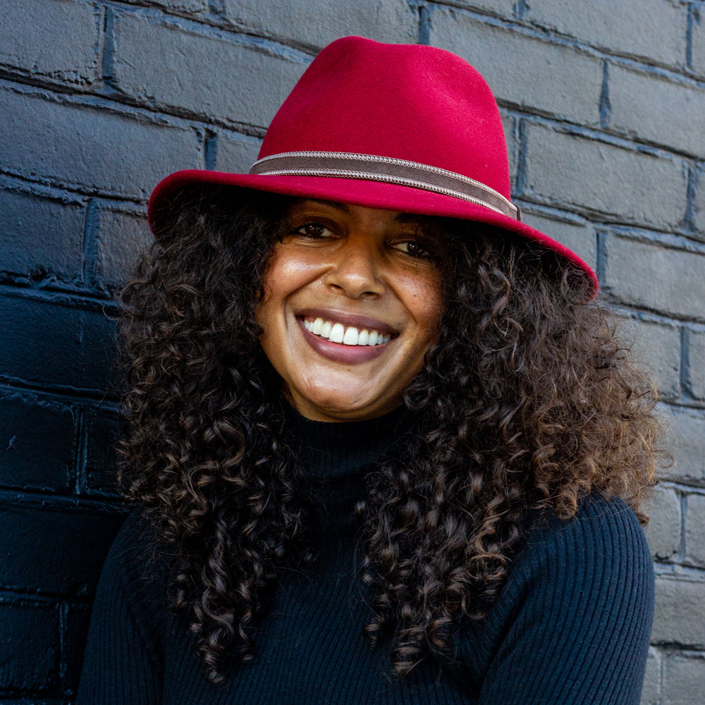 Wine-colored safari hat with center dent crown and suede band, perfect for men and women