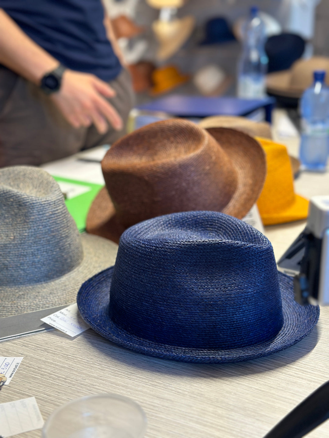 Hats on a worktable