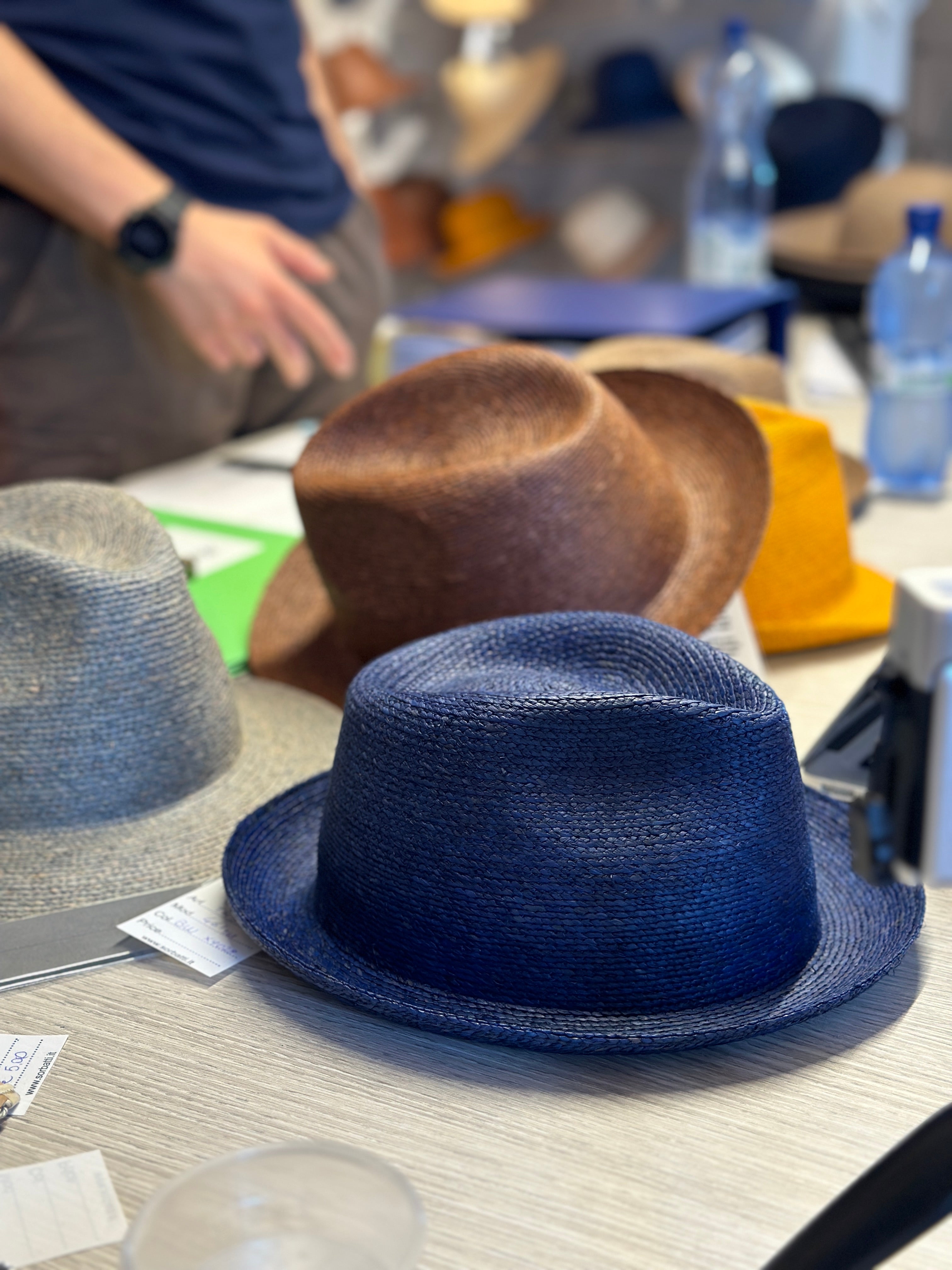 Hats on a worktable