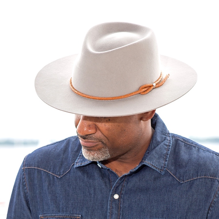 middle aged man wearing a handmade fedora hat