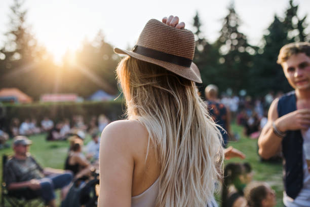 Girl in hat at festival