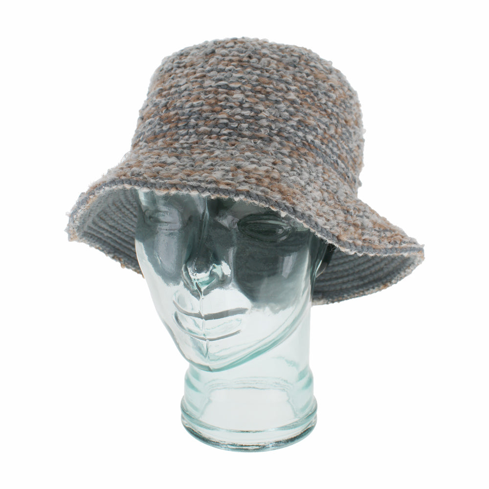 Close-up of Adelma grey knit bucket hat showing soft texture and casual styling