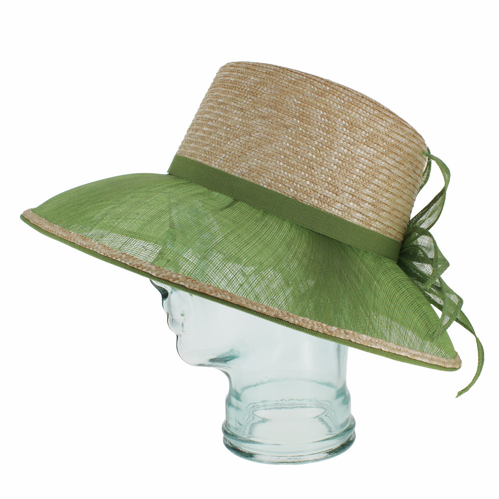 Green straw lampshade hat with floral detail for garden parties and outdoor events