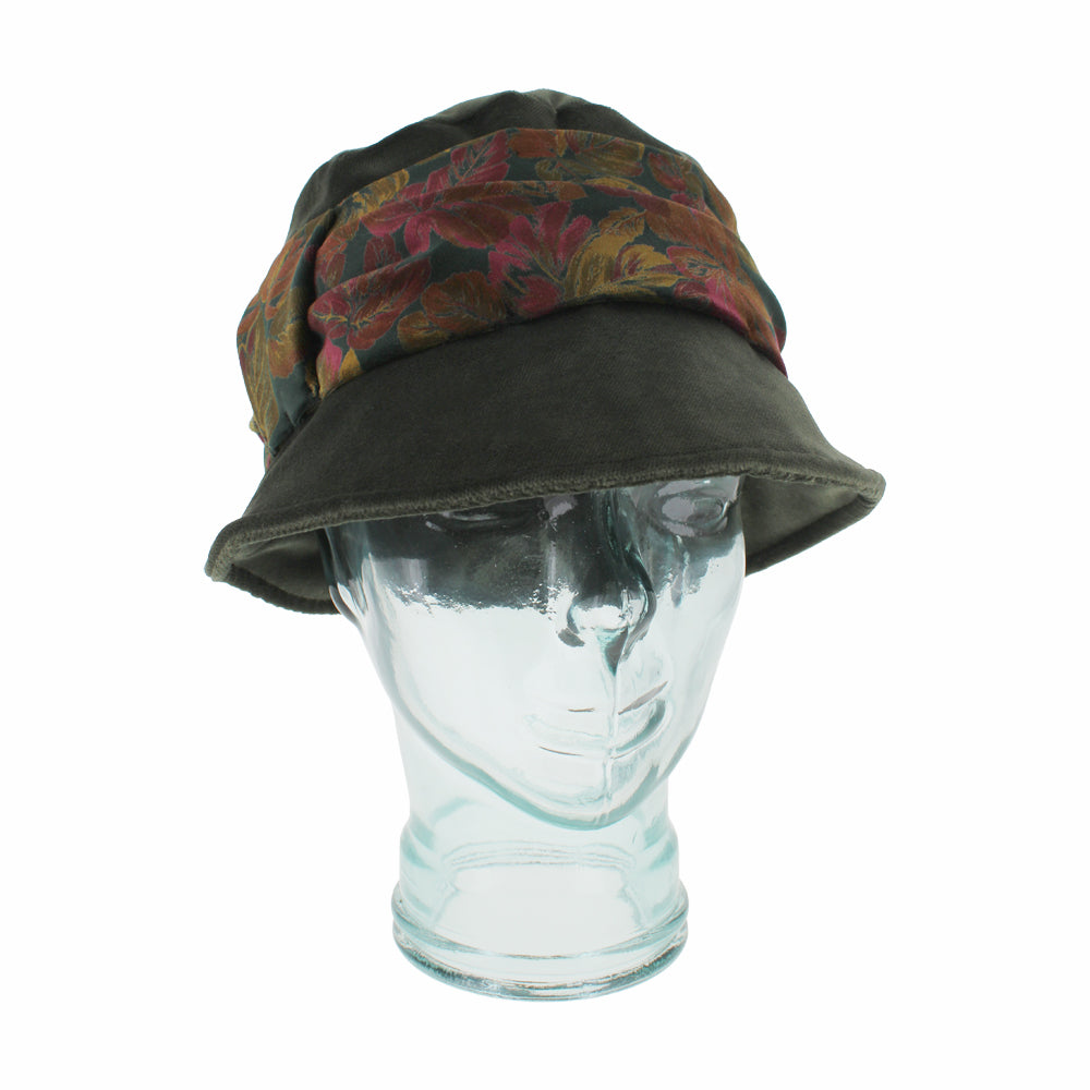 Olive Belfry Aronne cloche-style bucket hat featuring rich velvet floral band detail