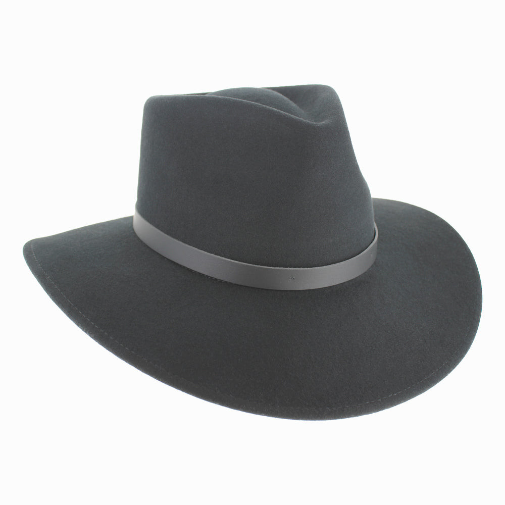 Model wearing Black Belfry Alejandro wool safari hat with wide brim for stylish fall winter travel looks