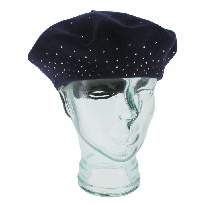 Belfry Bella navy tam hat crafted from 100% wool with a delicate rhinestone design, a timeless women’s accessory adding sparkle and elegance to autumn and winter outfits