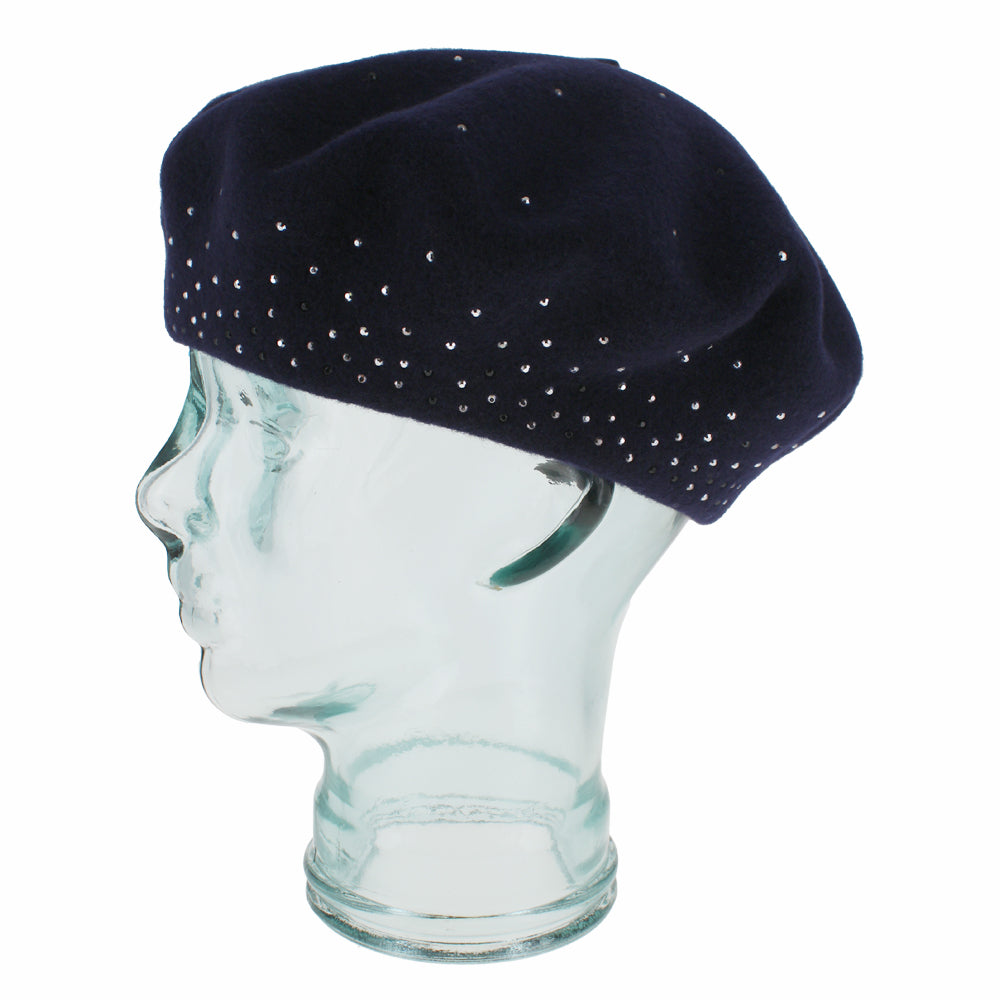 Angled view of the Belfry Bella navy wool tam hat showcasing its soft fabric and rhinestone detailing, a cozy yet glamorous accessory for autumn and winter daily outfits