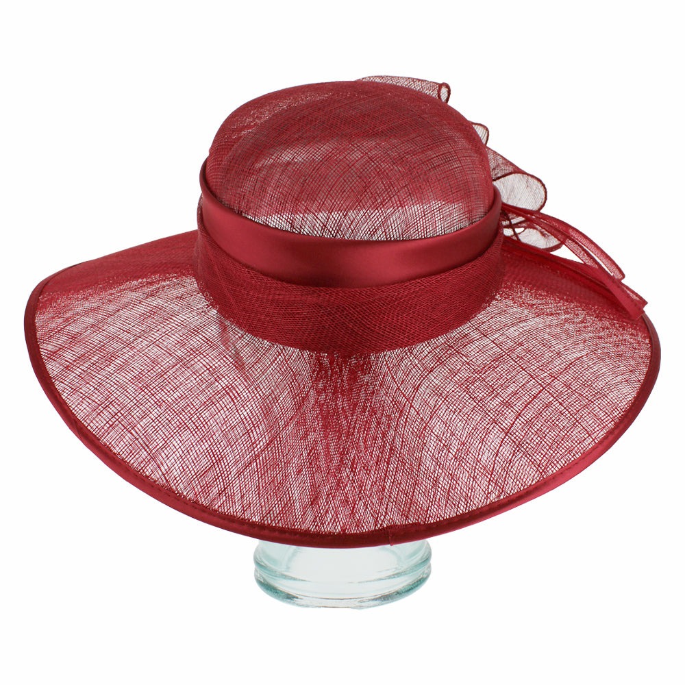 Elegant red sinamay dress hat with structured shape for weddings and events