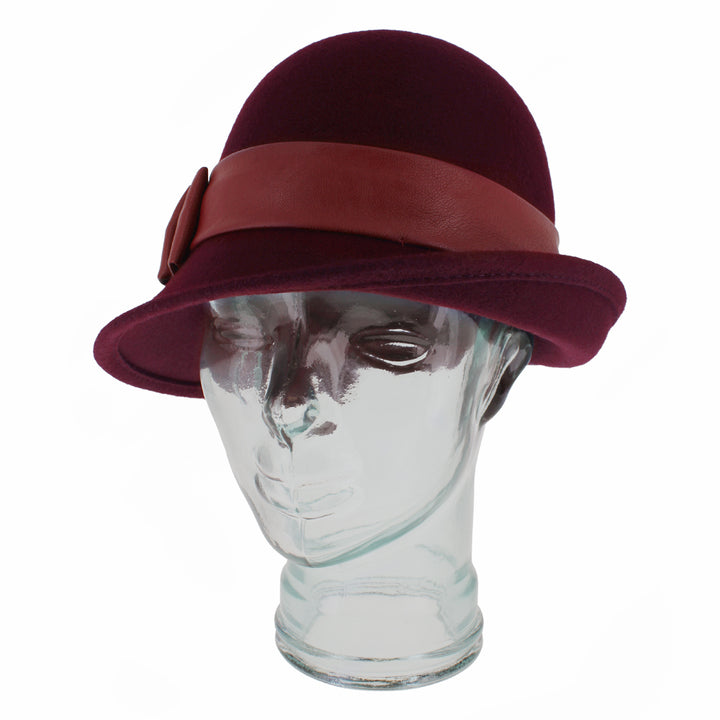 Close-up of Carabelle wine cloche hat showing wool texture and folded leather band
