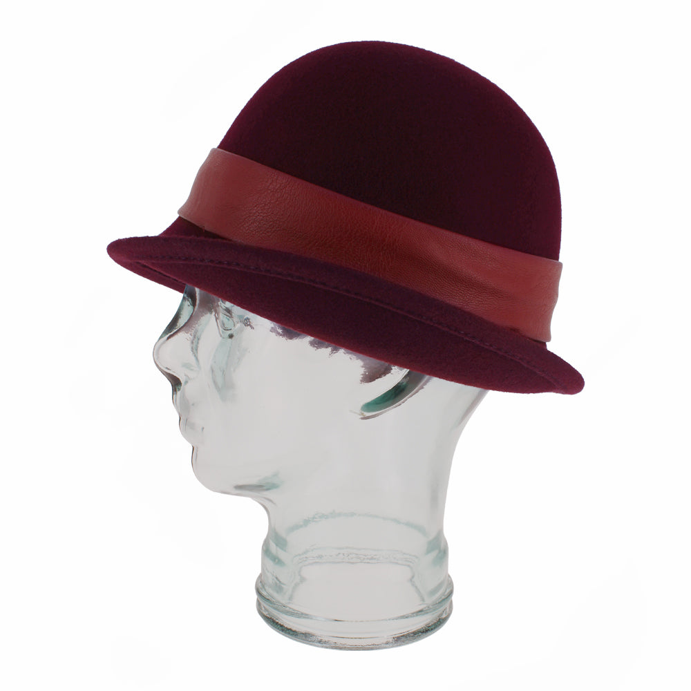 Wine Belfry Carabelle cloche with vintage-style leather band and graceful shape