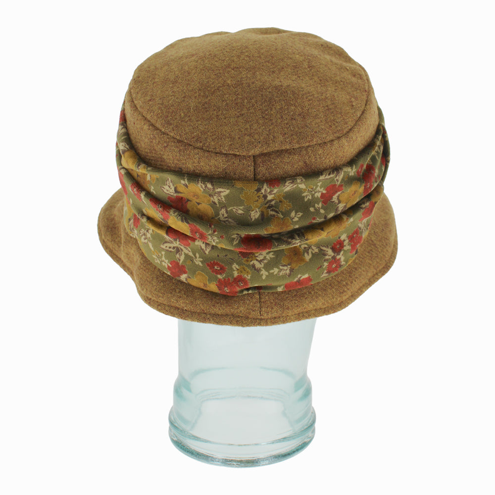Top view of Belfry Cassio gold bucket hat highlighting its soft wool texture and trim