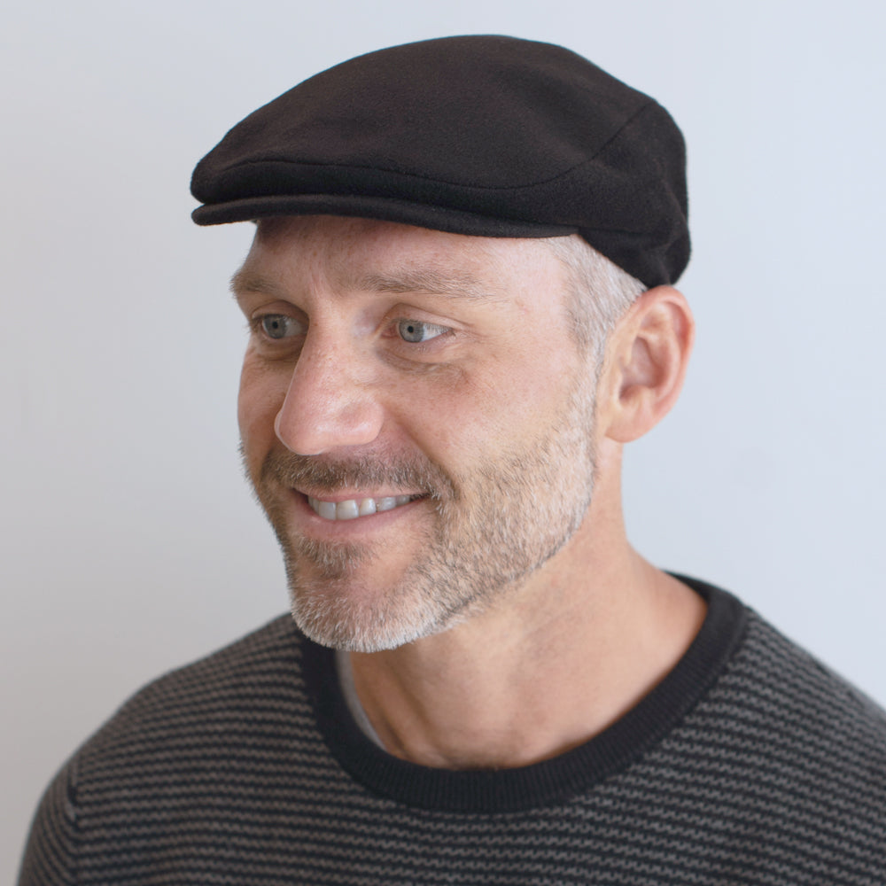 man wearing black cashmere cap belfry cipriano