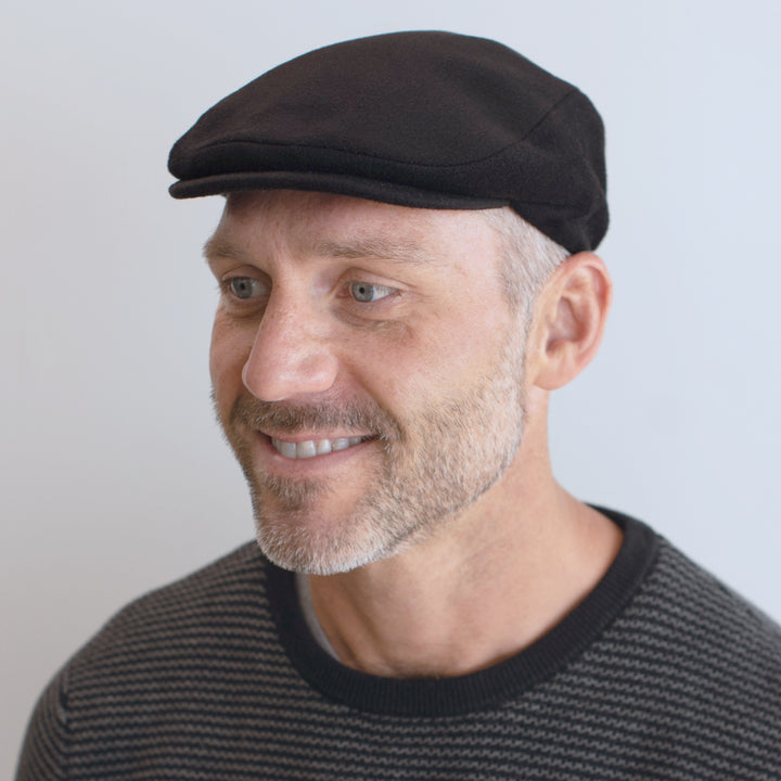 man wearing black cashmere cap belfry cipriano