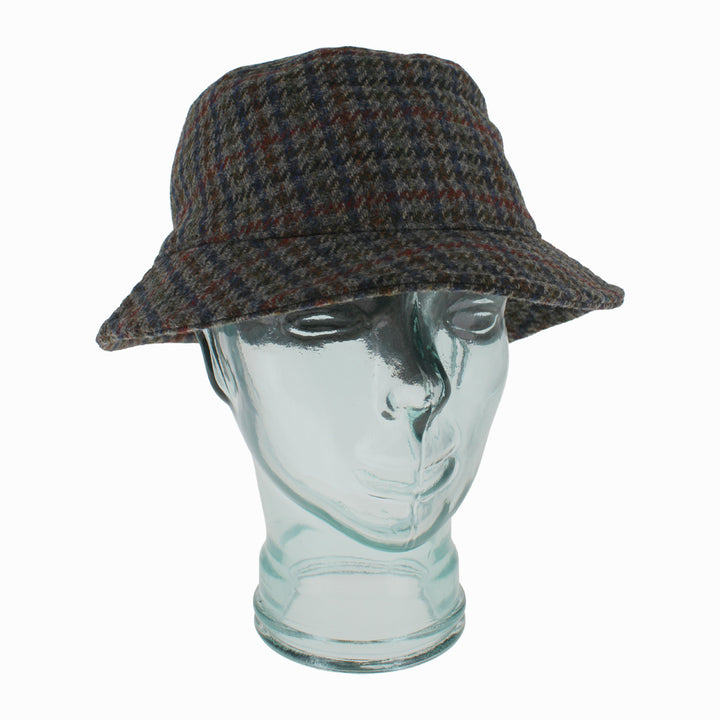 Model wearing Houndstooth Belfry Crostini wool bucket hat for classic, warm fall winter looks