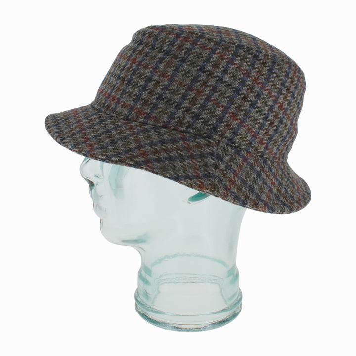 Close-up of Houndstooth Belfry Crostini bucket hat in virgin wool with quilted lining for cold-weather outfits