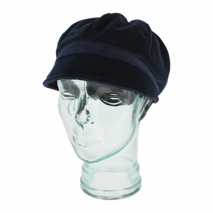 Close-up of Belfry Dania navy 8-panel cap showing soft velvet and clean detailing