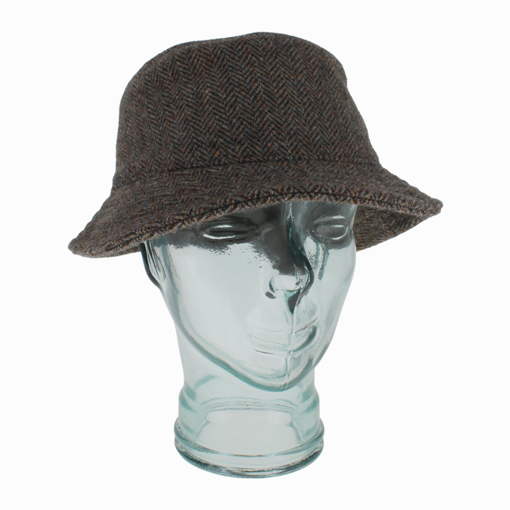 Model wearing Herringbone Belfry Desi multicolor wool bucket hat for warm fall winter looks