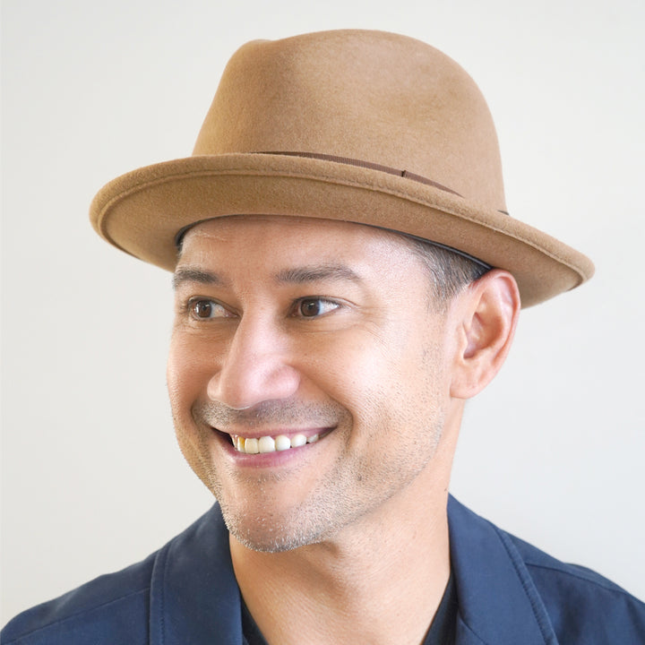 Argill Belfry Dolore wool stingy-brim fedora with center crease and grosgrain band, packable for fall winter travel