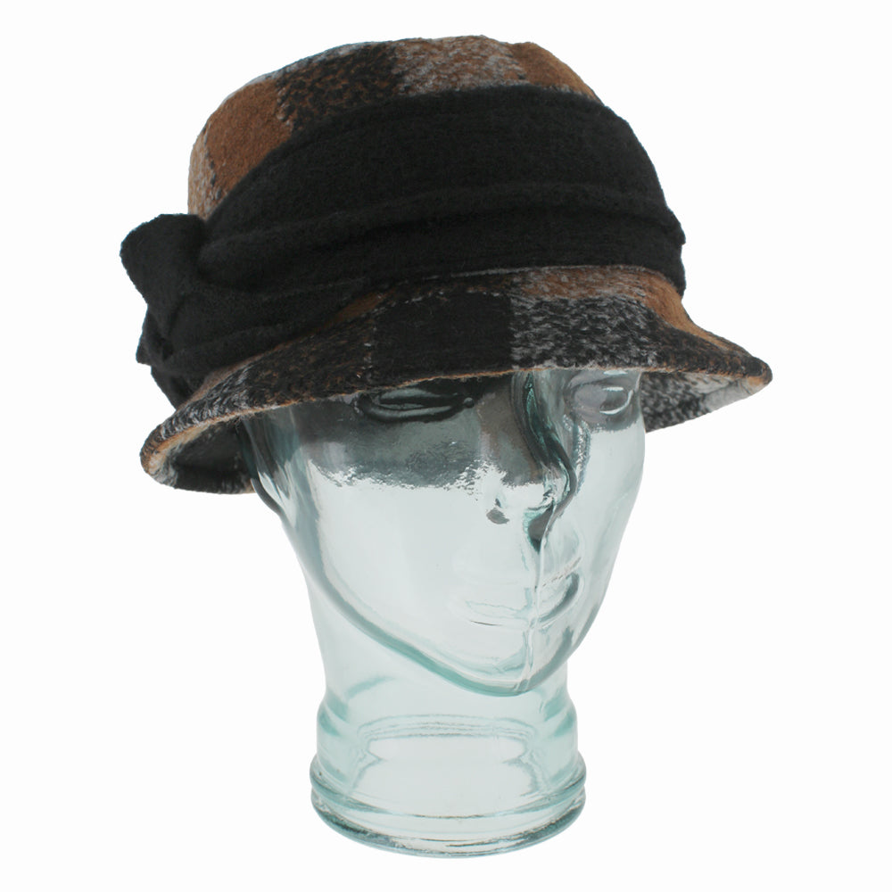 Belfry Donata bucket hat in brown plaid crafted from 80% wool and 20% polyester, featuring gray and ivory accents with a thick black band and bow, perfect for fall and winter wear