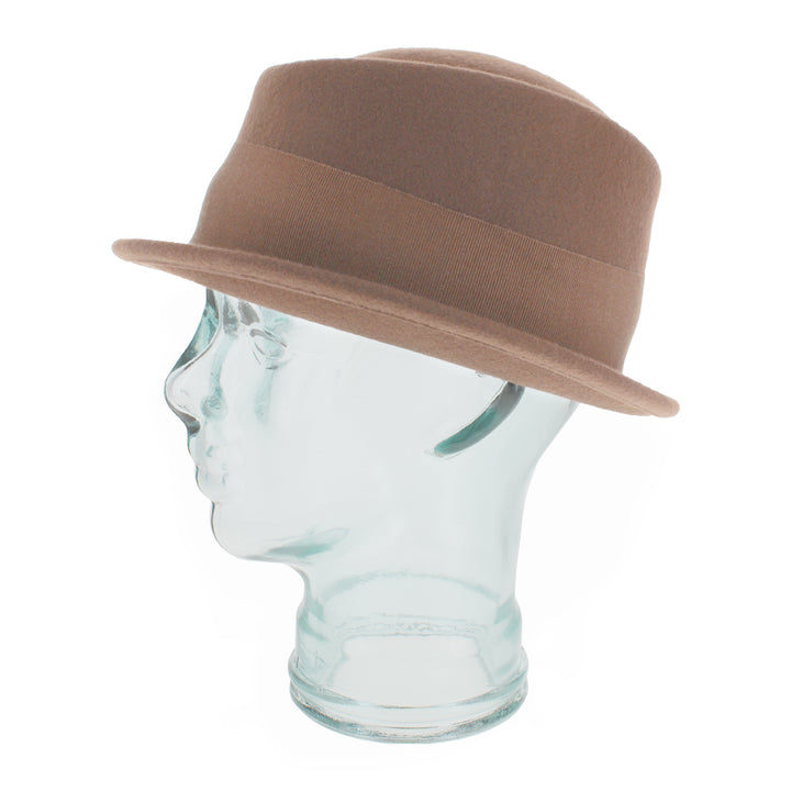 Angled view of the Belfry Donetta stingy brim hat in brown wool with cloche influence, combining warmth and stylish flair for autumn and winter fashion wardrobes