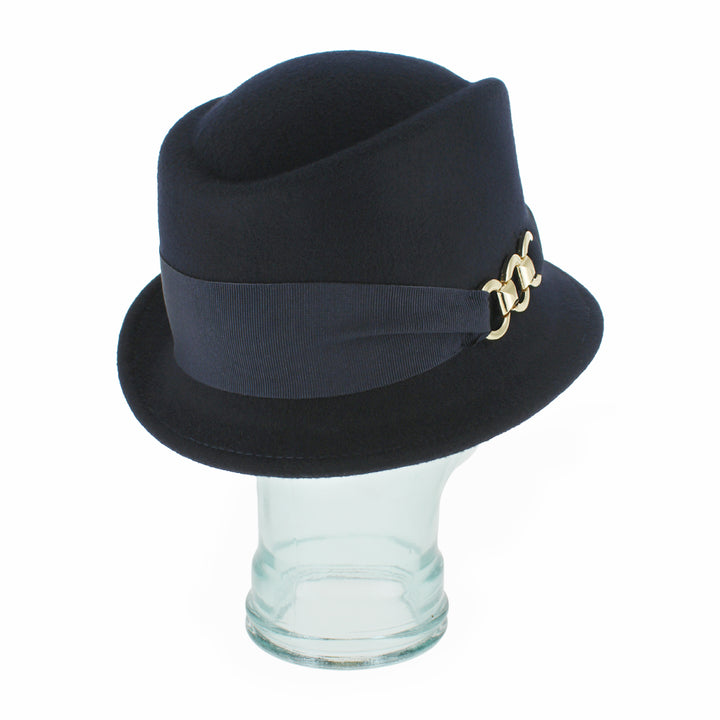 Side profile of the Belfry Donetta blue hybrid hat combining cloche and stingy brim fedora influences, crafted from wool with elegant grosgrain band and gold accent