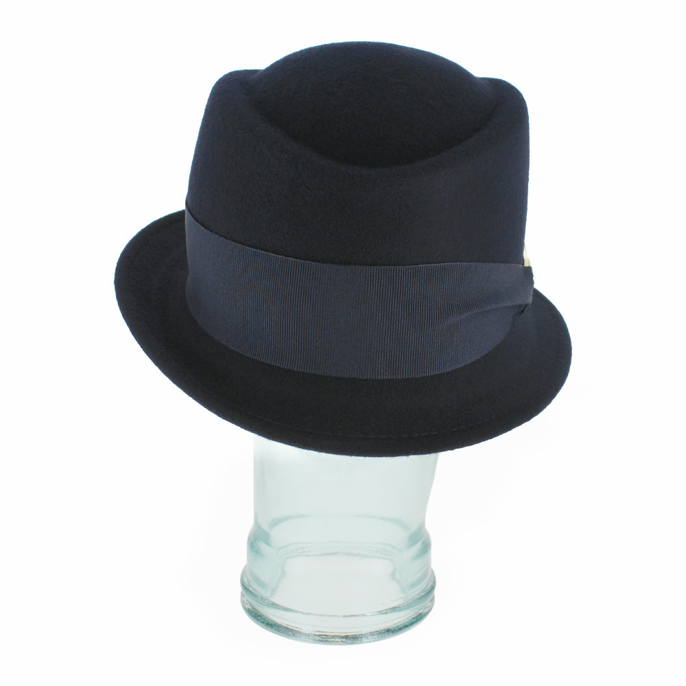 Detailed shot of the Belfry Donetta blue wool hat with tonal grosgrain band and gold link, a refined fall and winter accessory blending charm, warmth, and sophistication