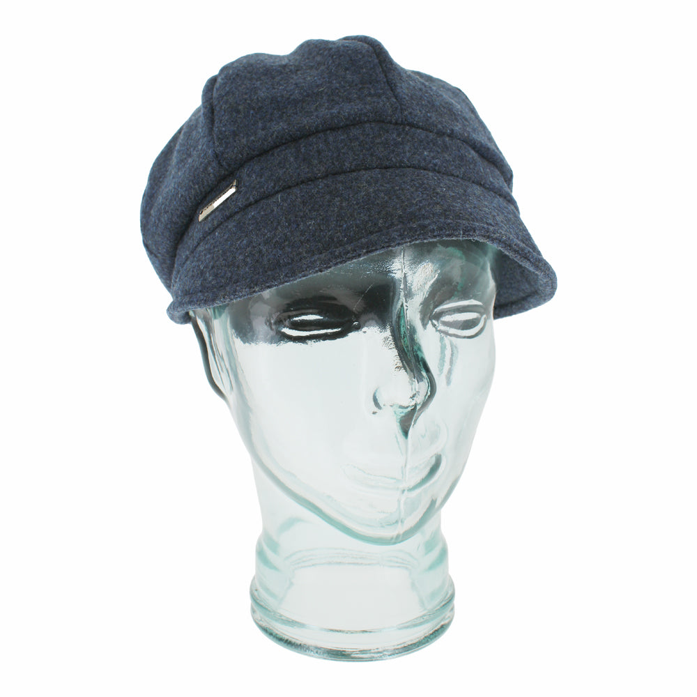 Blue Belfry Edda mod cap crafted from Shetland wool with clean structured shape
