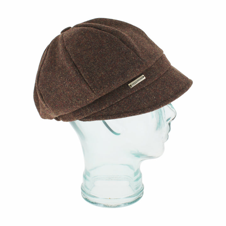 Side view of Belfry Edda brown cap showing warm Shetland wool texture