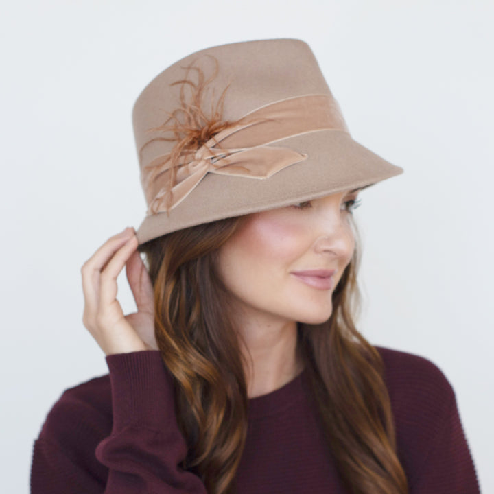 Belfry Edvige nude wool trilby with asymmetrical brim and velvet band accented by long feathers