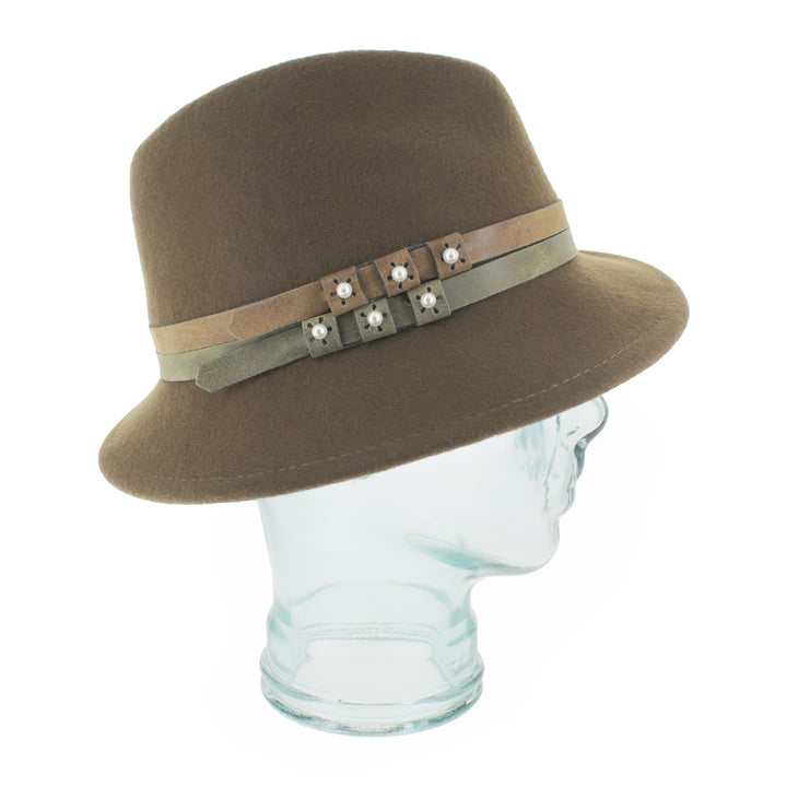 Close-up of the Belfry Elda olive trilby crafted from 100% wool, highlighting its asymmetrical brim, dual leather bands, and pearl accents, perfect for autumn and winter style
