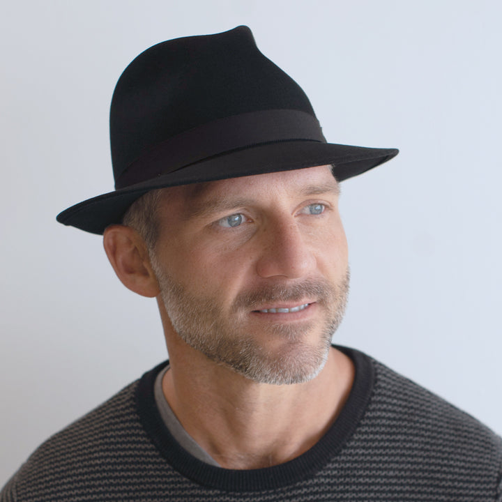 man wearing black fedora belfry frankie c with snapped brim