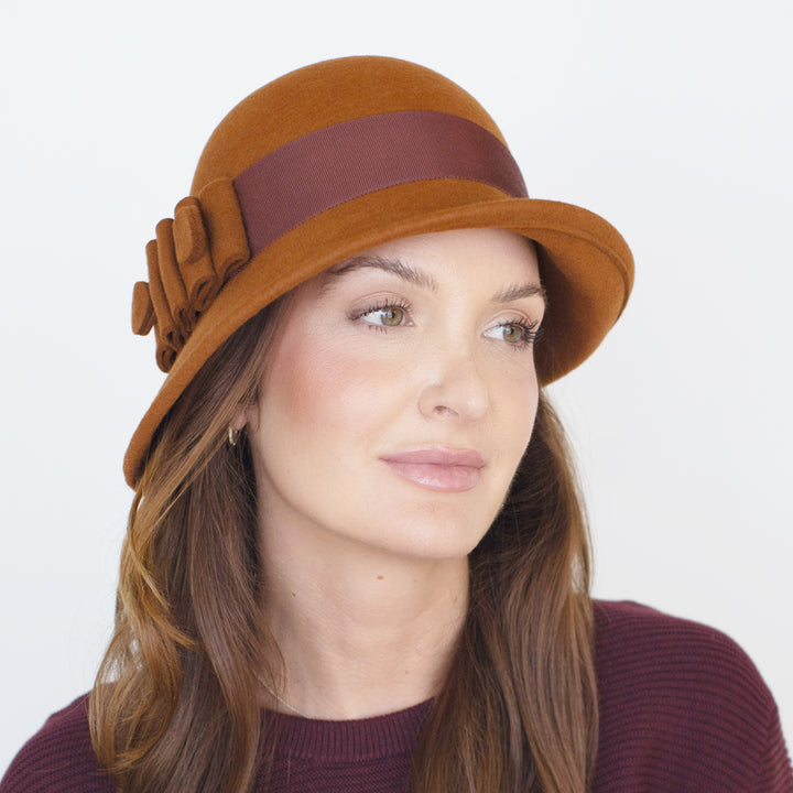 Belfry Ginny rust wool cloche with wide grosgrain band and five-loop felt bow