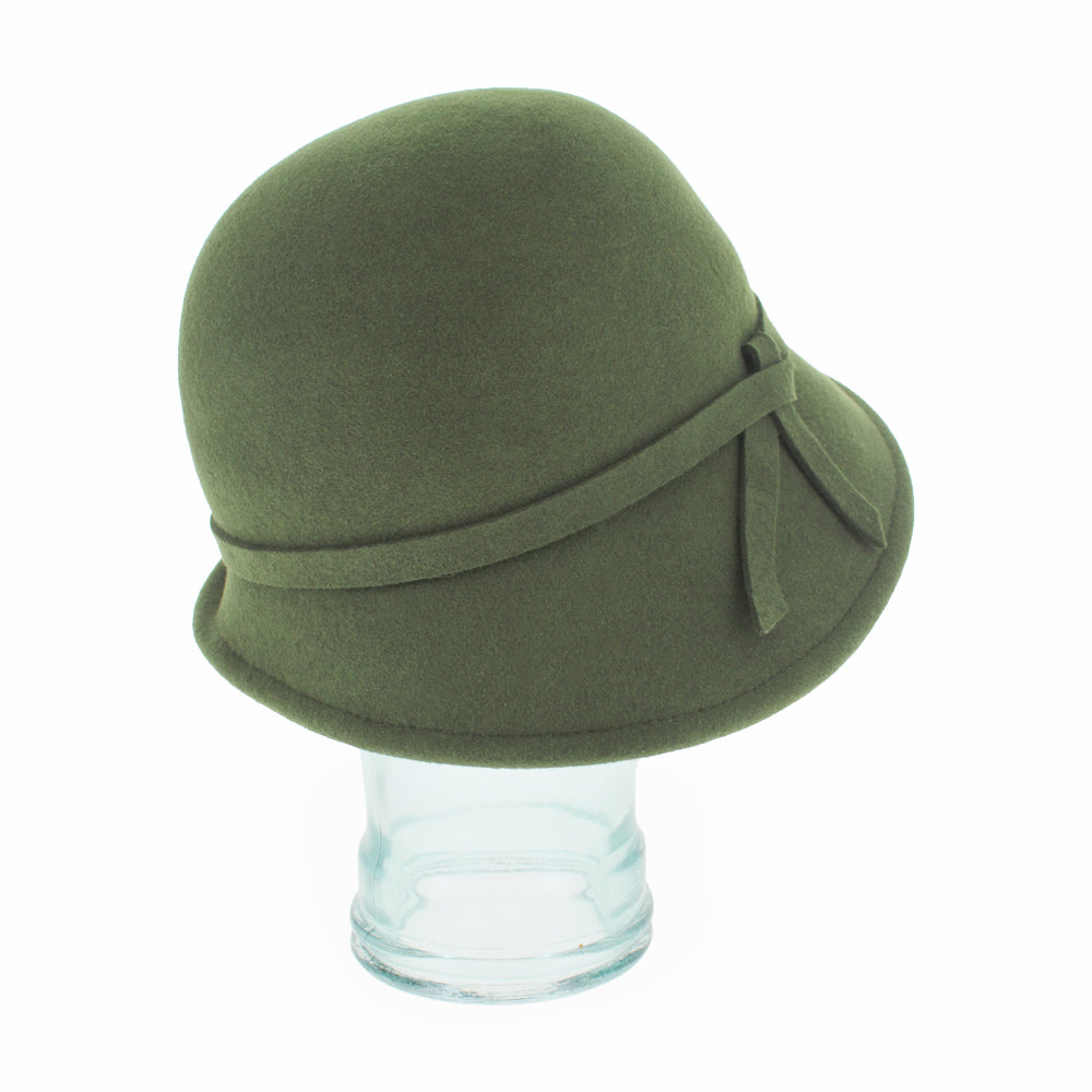 Side profile of the Belfry Harriet olive cloche hat in wool with an asymmetrical brim, a cozy cold-weather piece perfect for autumn and winter practical women’s fashion