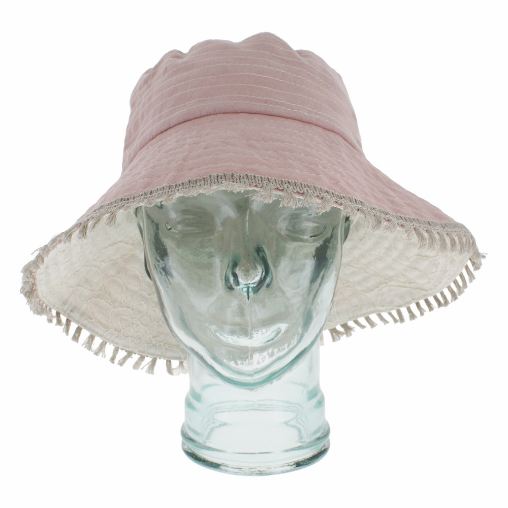 Light pink bucket hat with soft texture and lightweight comfort for sunny days