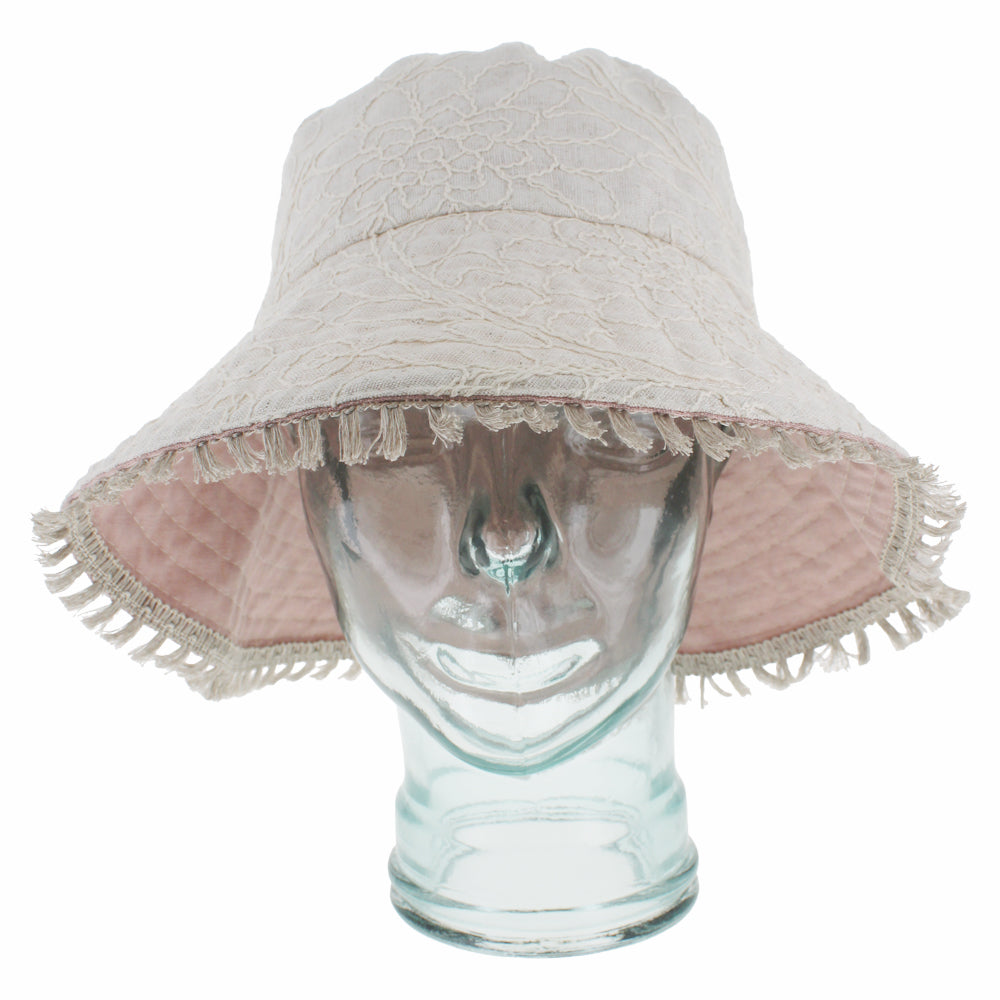 Light pink bucket hat designed for travel casual wear and easy maintenance