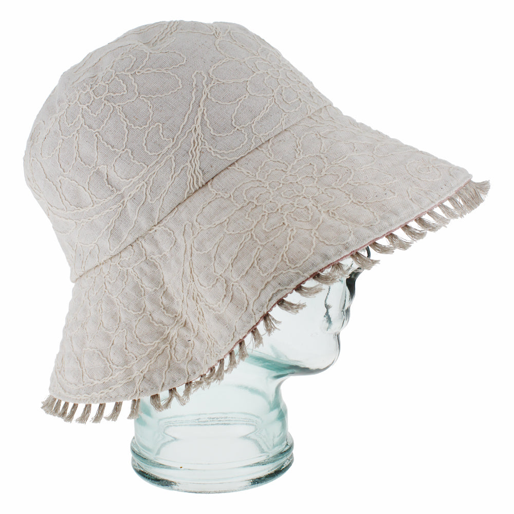 Light pink bucket hat with flexible brim and packable design for everyday wear