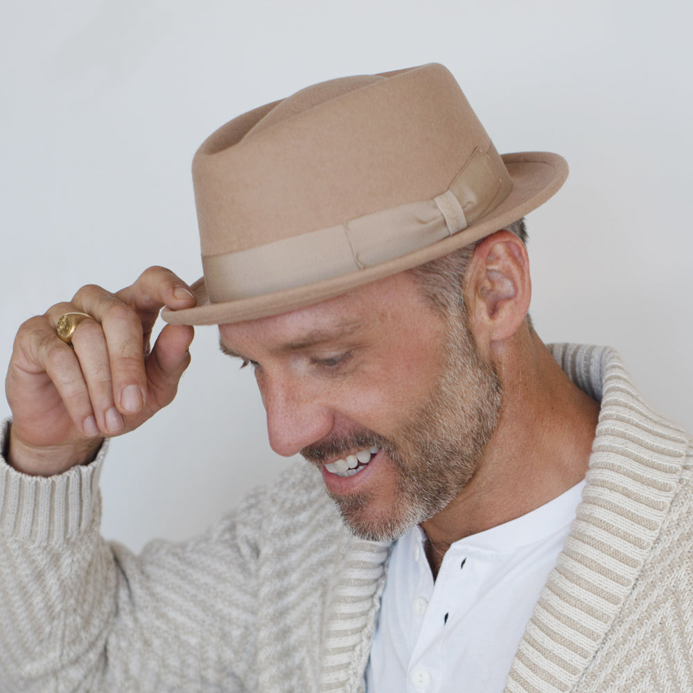 Blush wool pork pie hat with diamond crown and grosgrain ribbon band by Belfry Italia