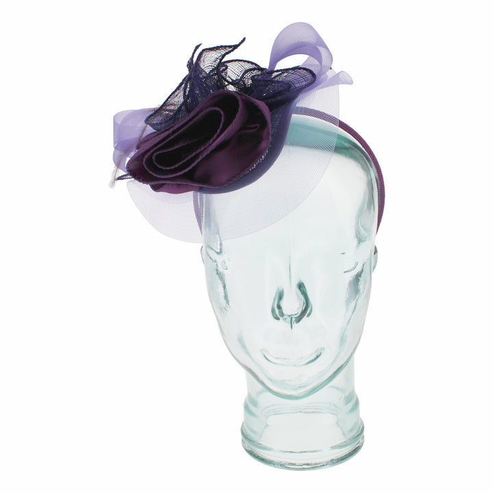 Purple headband fascinator with satin flower designed for races weddings and events