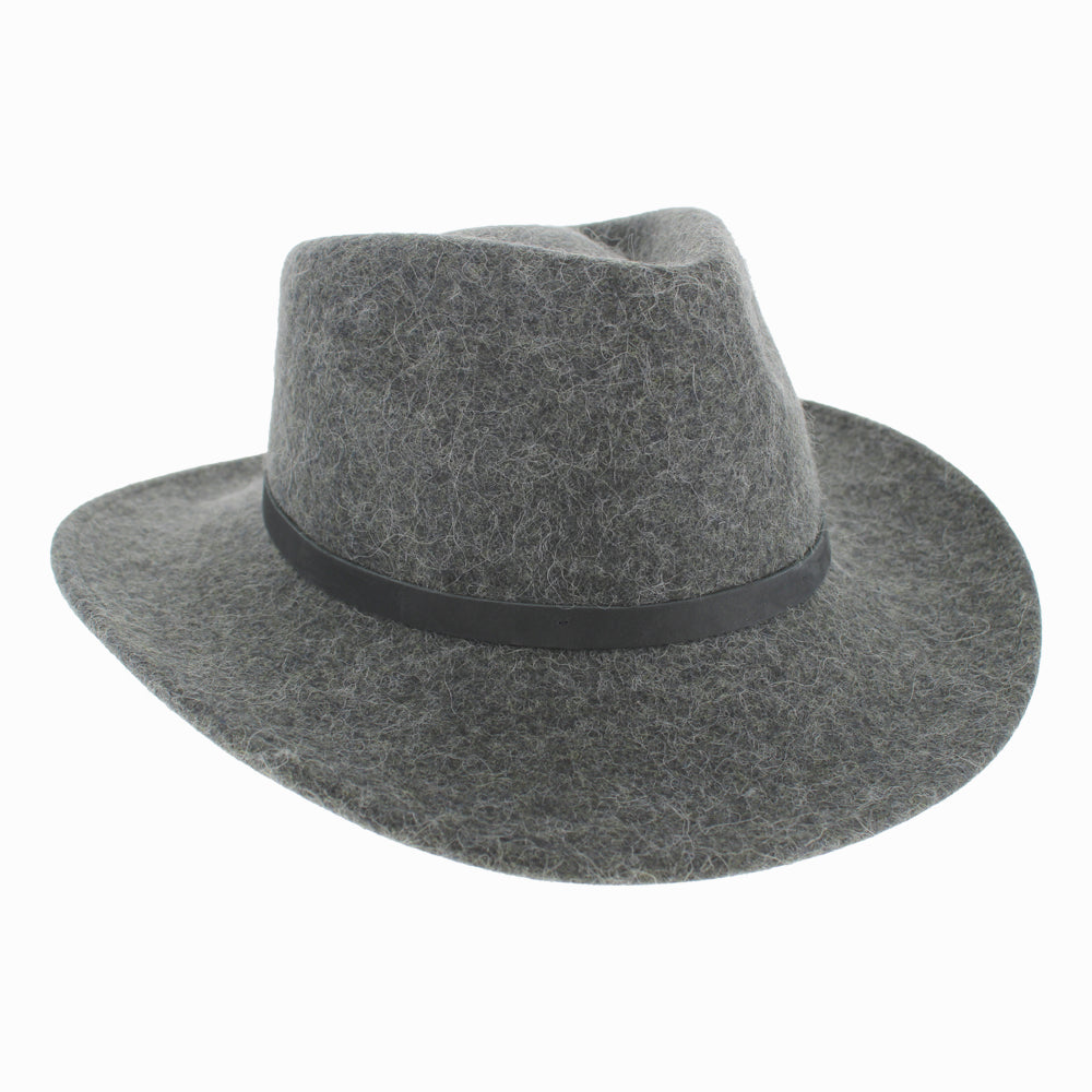 Model wearing Grey Belfry Diego wide-brim alpaca wool safari hat for bold fall winter fashion