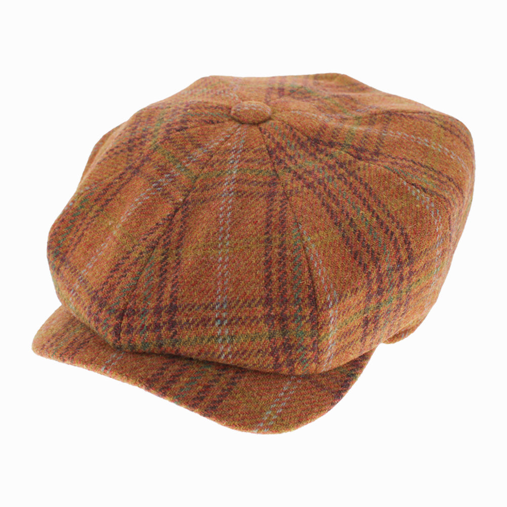 Wigens Milchick newsboy retro cap in burnt orange wool plaid with subtle purple and green accents, a Limited Edition style from the Wigens Archive Line, perfect for fall and winter wear