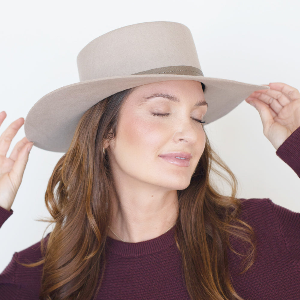 Nude Belfry Mirta bolero-style hat featuring a smooth wool body and simple leather band