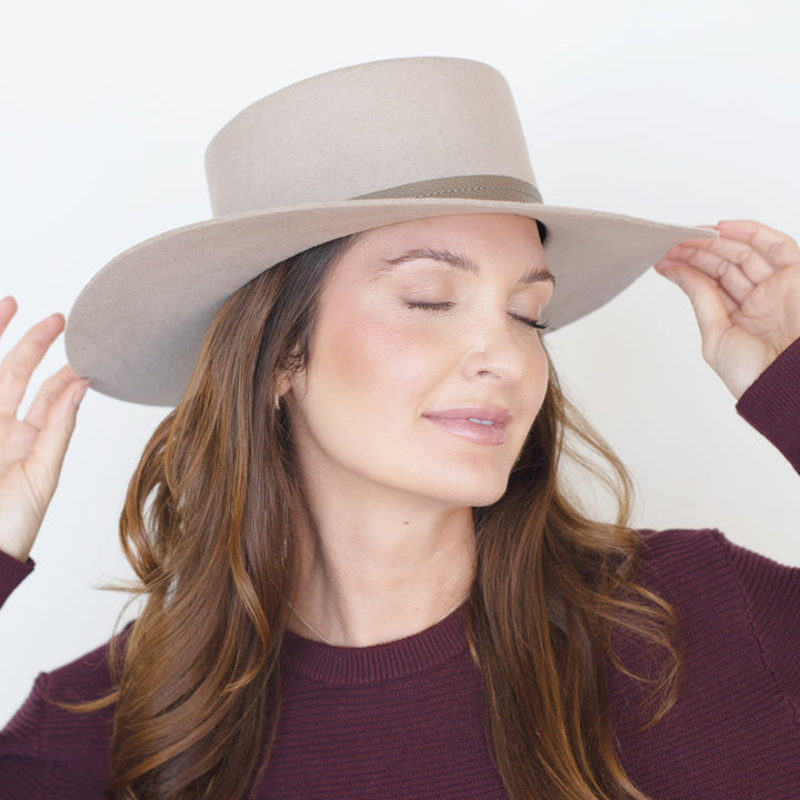 Nude Belfry Mirta bolero-style hat featuring a smooth wool body and simple leather band