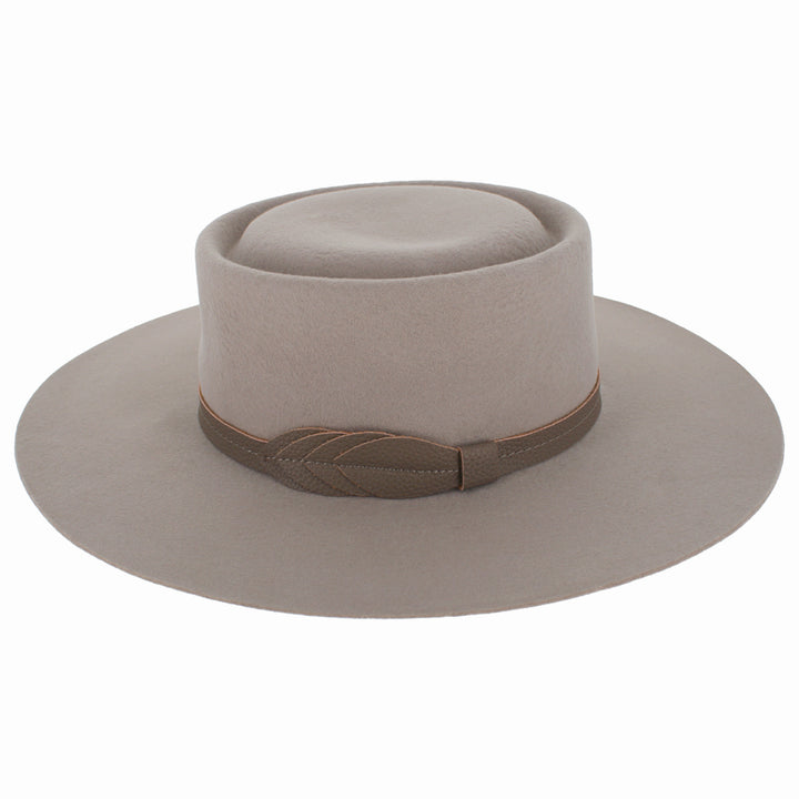Top view of Belfry Mirta nude hat highlighting its crisp crown and bolero shape
