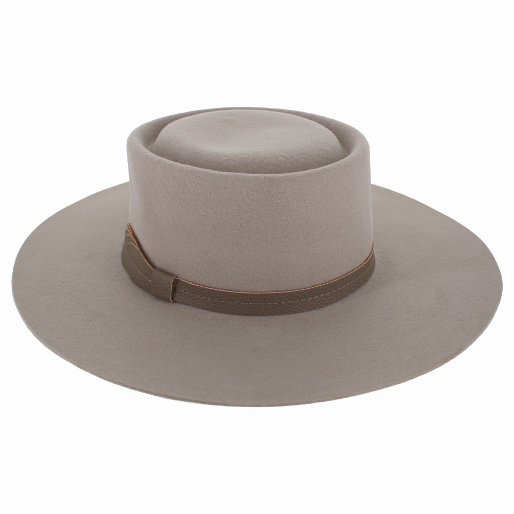 Angled shot of Mirta nude boater hat showing clean lines and wide brim