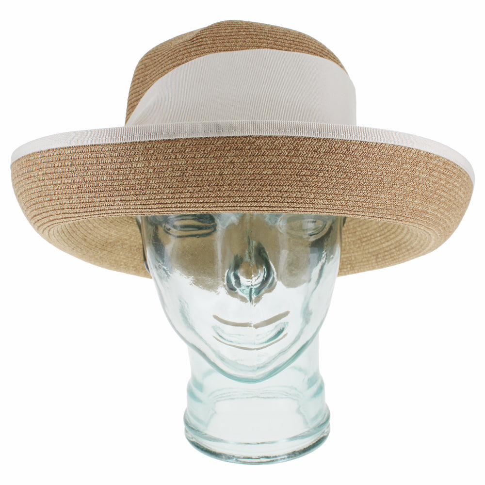 Natural cloche hat designed for summer travel and casual wear