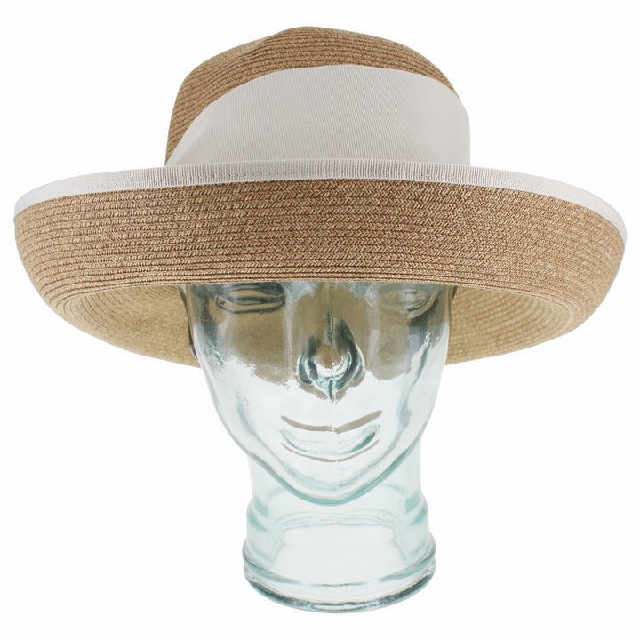 Natural cloche hat designed for summer travel and casual wear