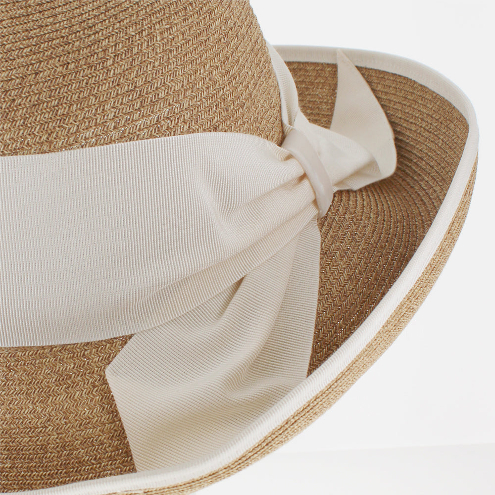 Natural paper yarn cloche hat with flexible packable construction and bow detail
