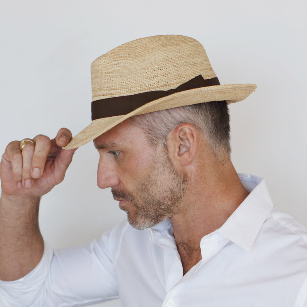 Natural raffia straw snap brim fedora with crocheted weave and brown grosgrain band by Belfry Italia